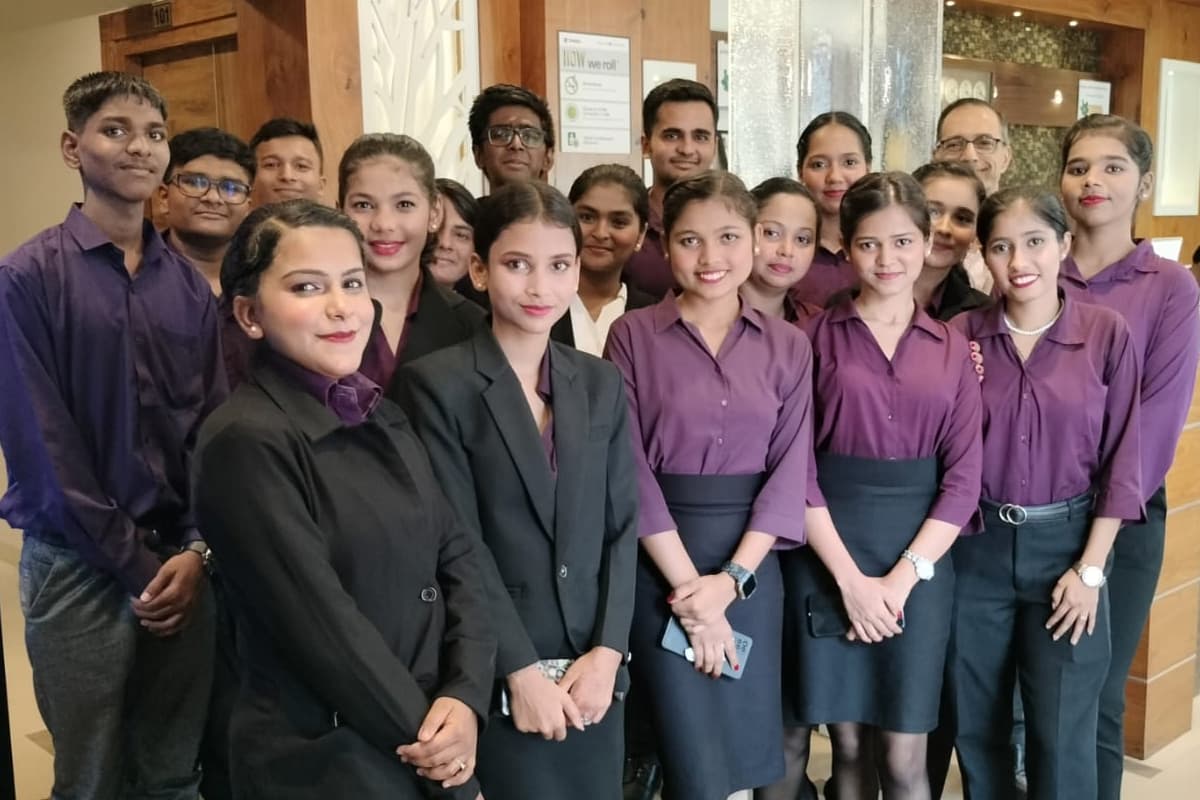 A Centuria batch in uniform standing together indoors